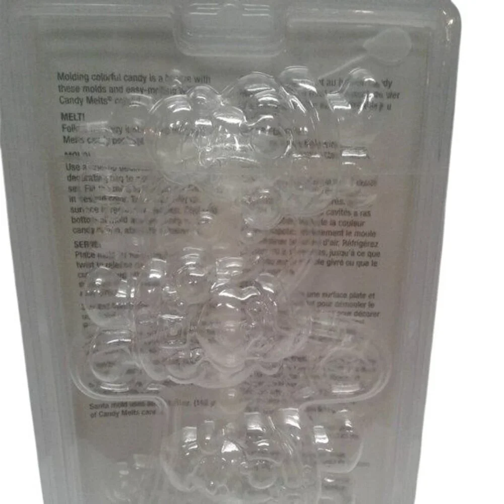 Wilton Christmas 3-Piece Candy Mold Set Snowflakes Gingerbread Men Santa Shapes